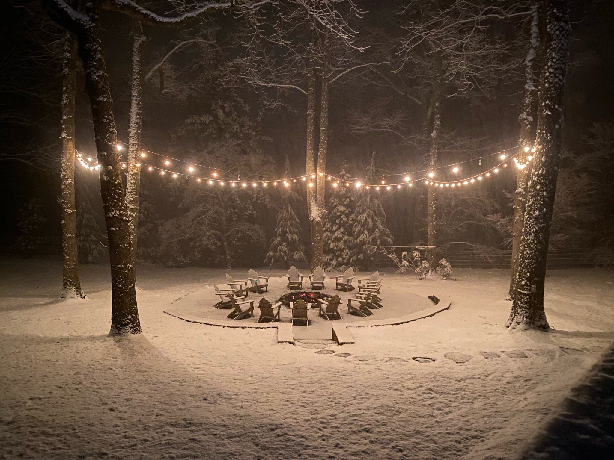 Winter fire pit with string lights