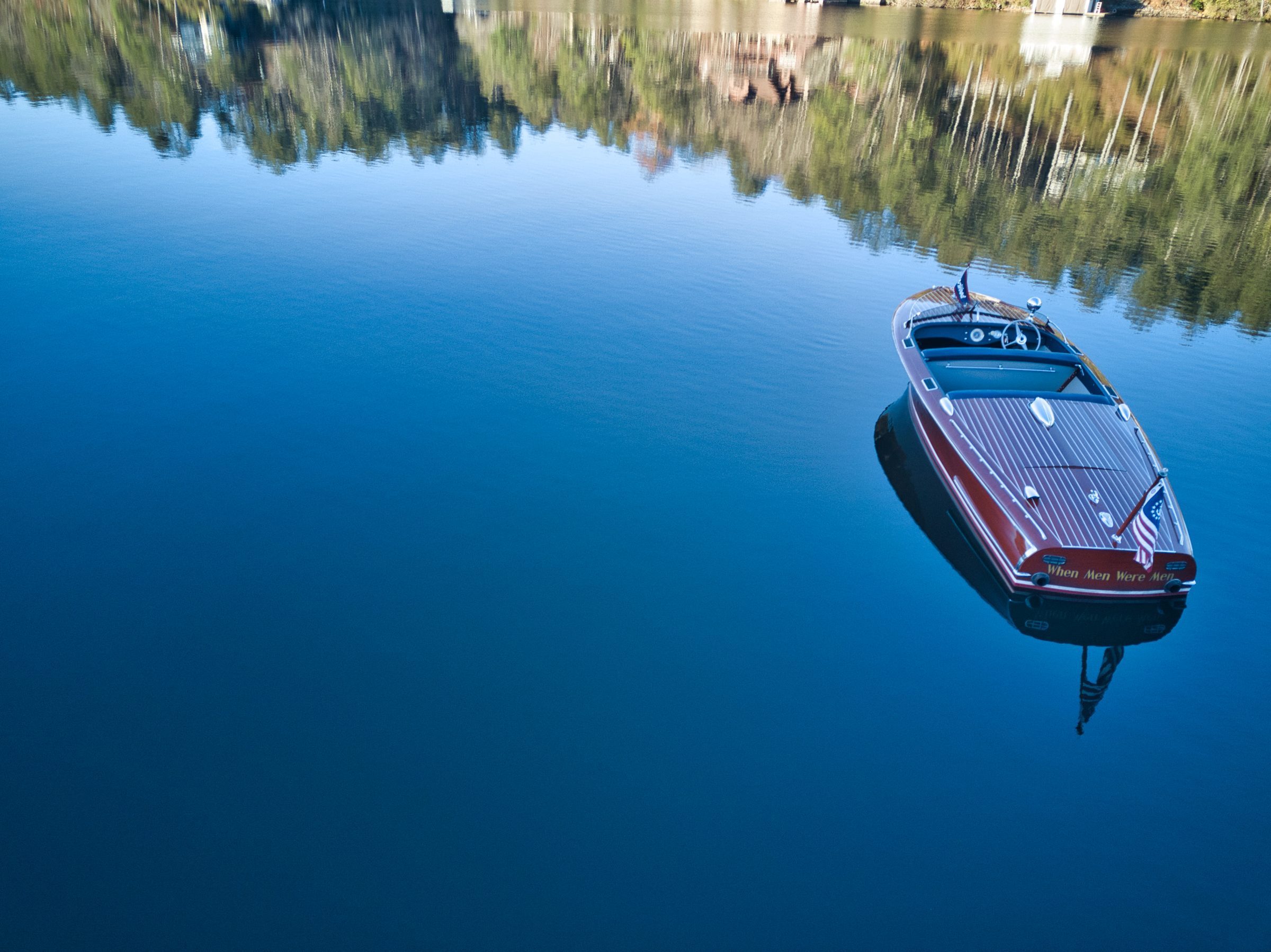 Gar Wood on glass-still water