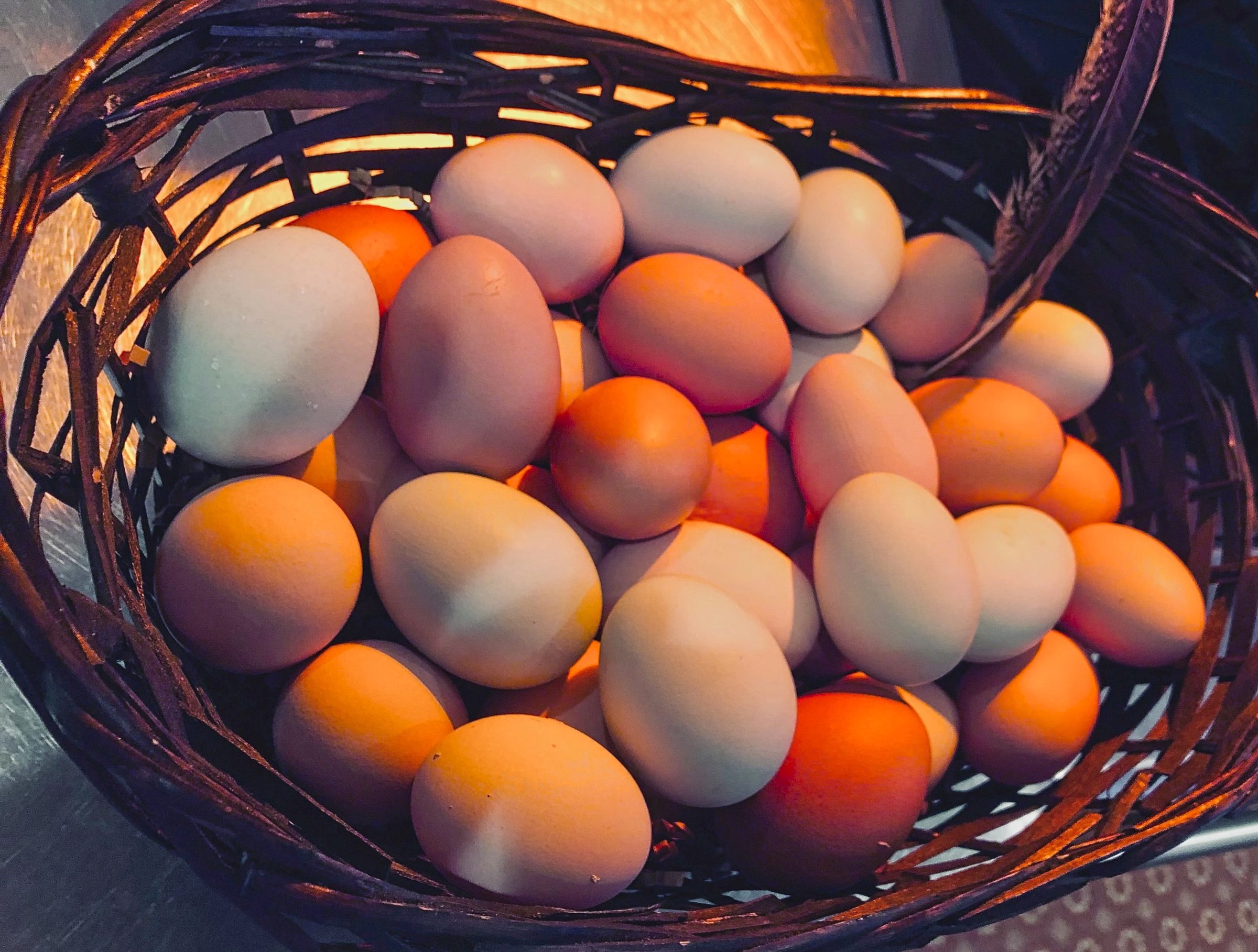 Farm fresh eggs in a wicker basket